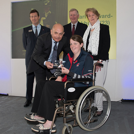 Mari receiving her award from Ray Wilkins MBE
